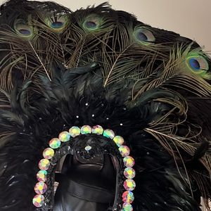 Gorgeous peacock headdress, several pageant dresses worn by former Ms gay Oklaho
